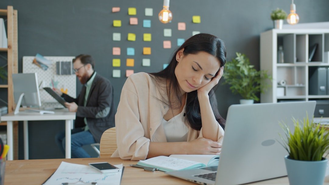 tired woman desk fatigue