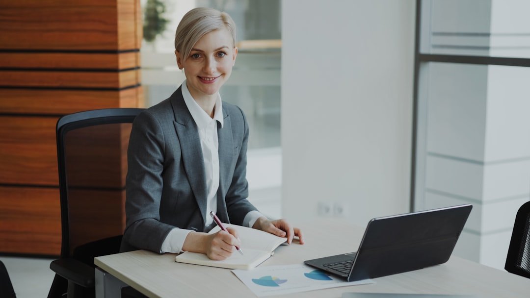 woman planning notebook desk
