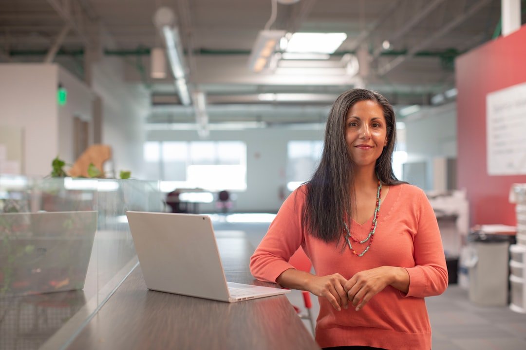 woman working desk confident