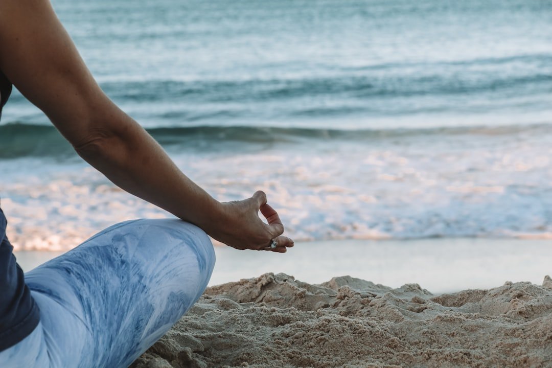 person meditating calm pose