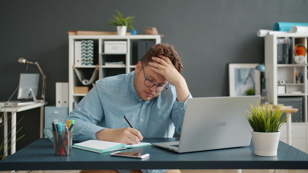 stressed professional at desk