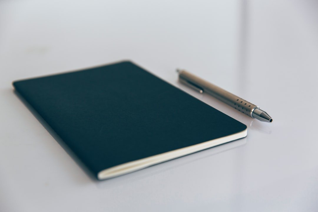 notebook pen desk workspace