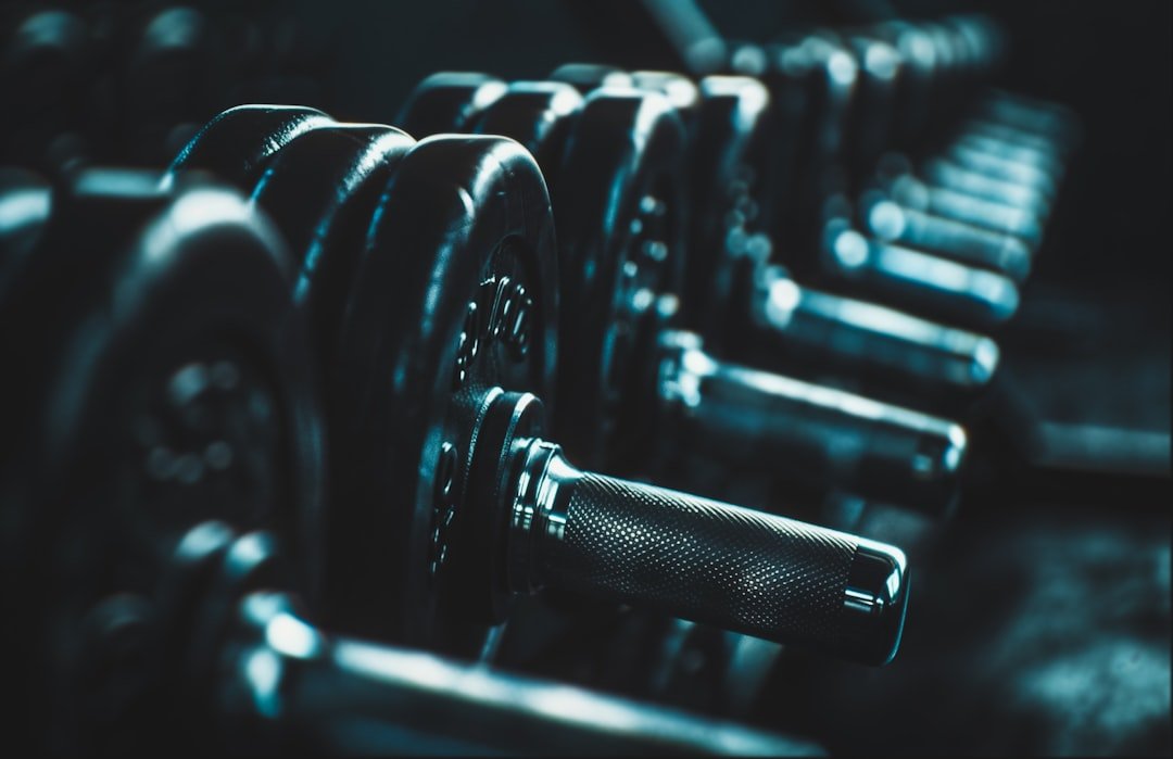 evening workout gym dumbbells