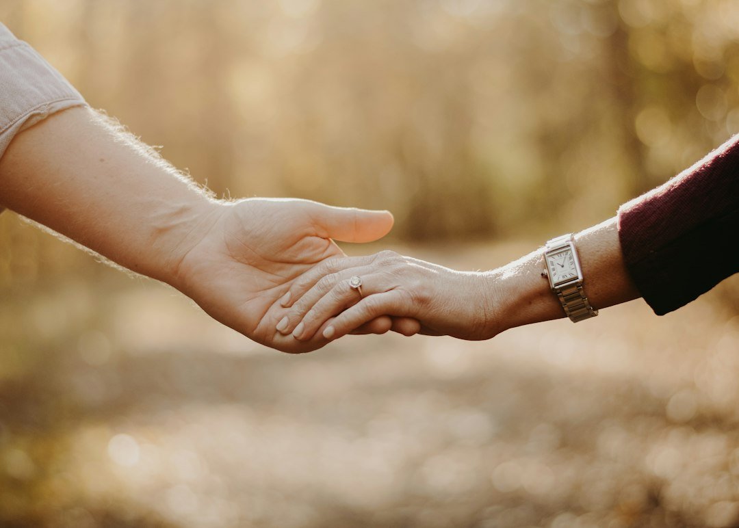 couple holding hands close