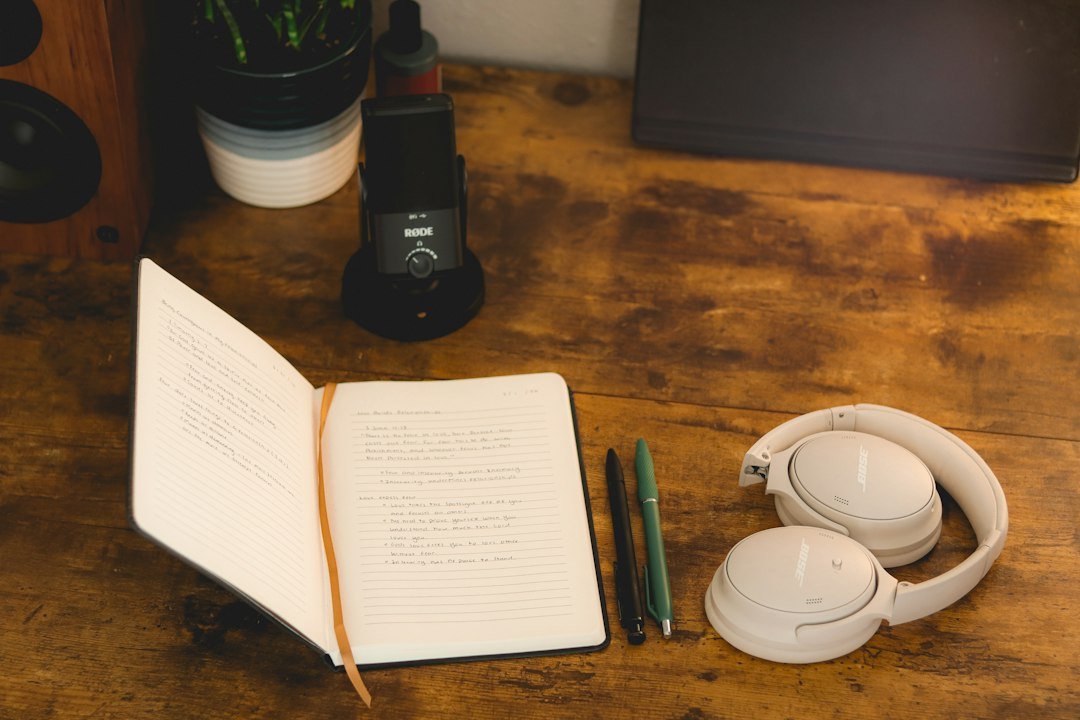 open notebook pen wooden desk