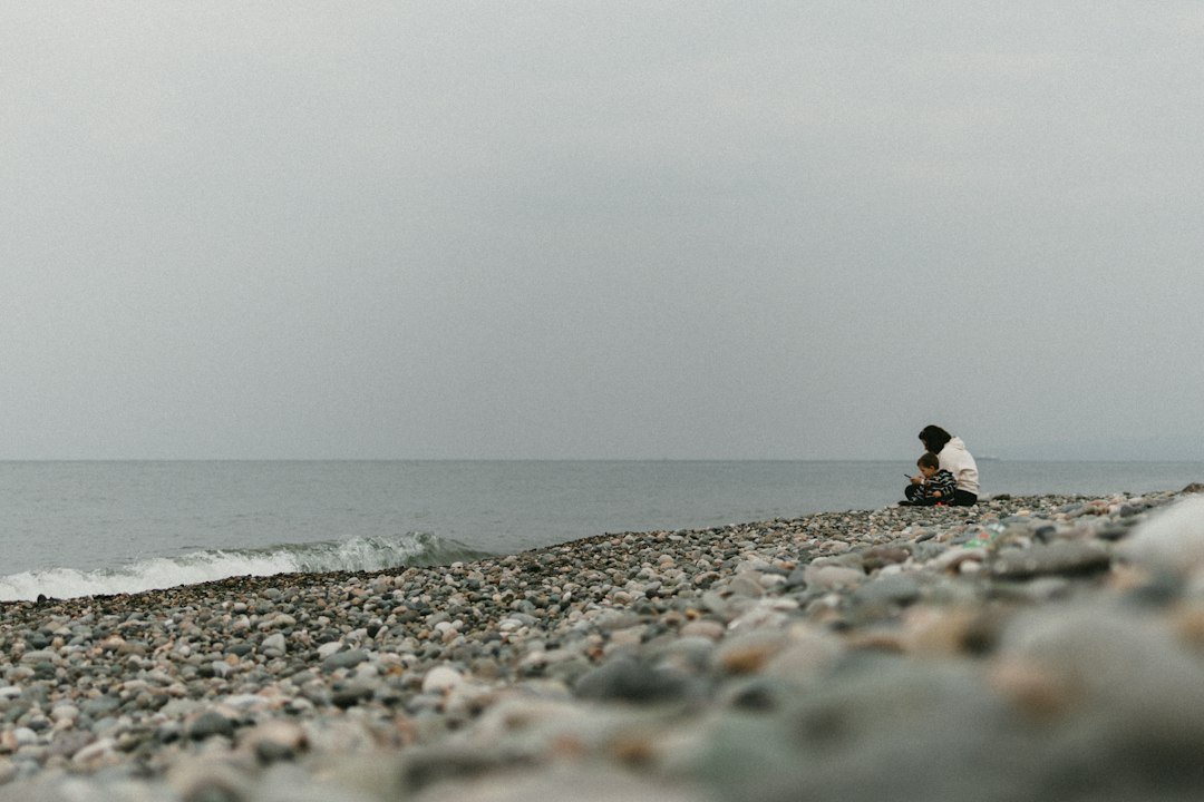 child sitting alone nature