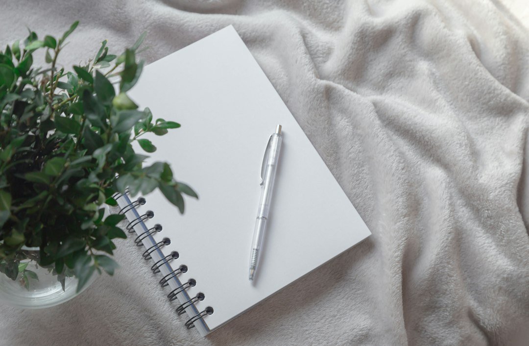 open notebook pen desk planning